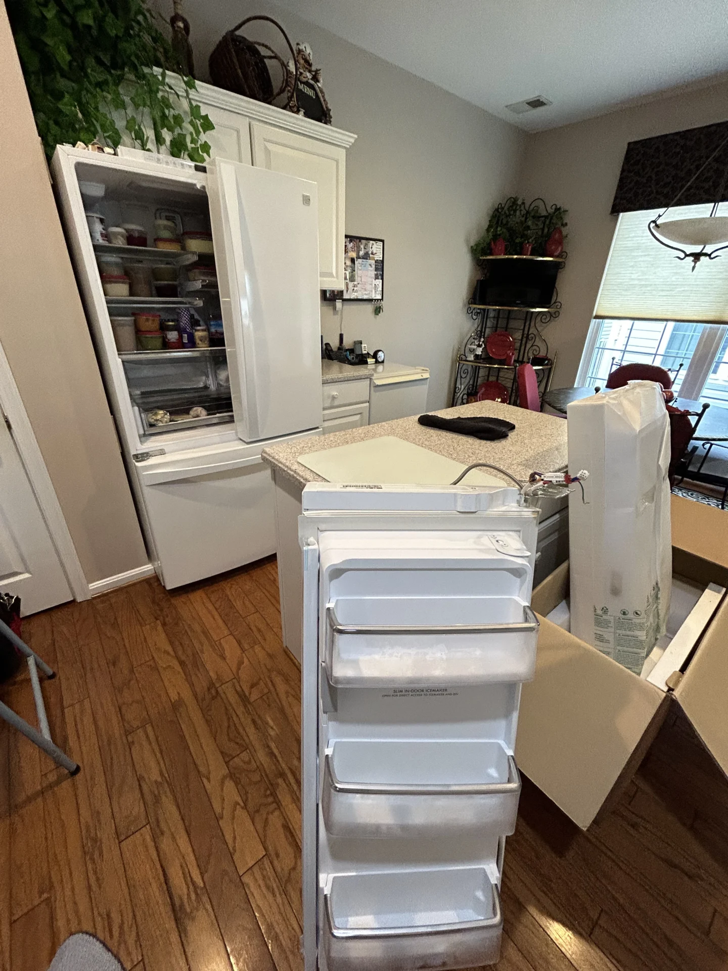 Old LG refrigerator door removed due to embedded heater burnout
